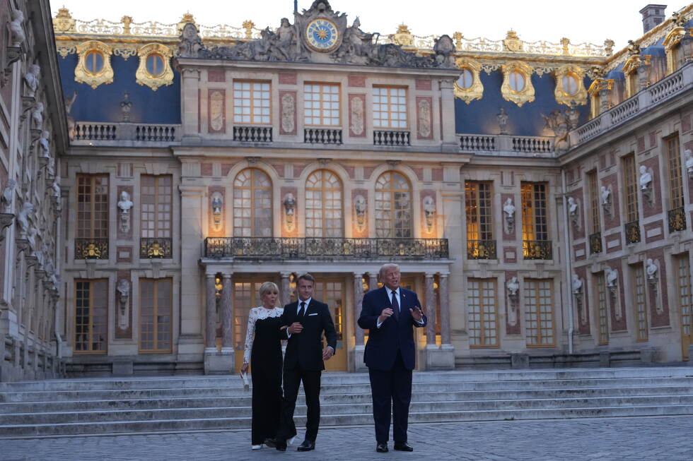 Macron applauds Trump signing of Iran deal at Versailles Palace