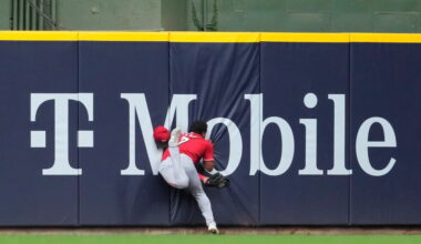 Reds' Dane Myers taken to hospital after crashing into wall