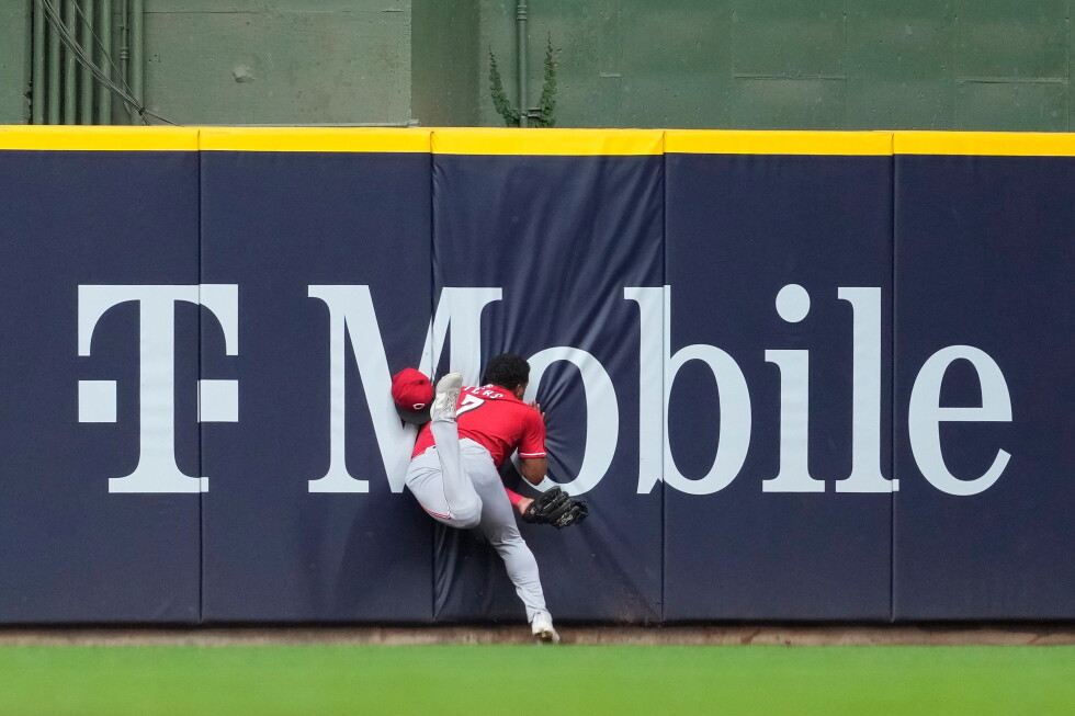 Reds' Dane Myers taken to hospital after crashing into wall