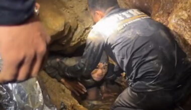 Laos rescue workers seek alternative route to 2 trapped in cave