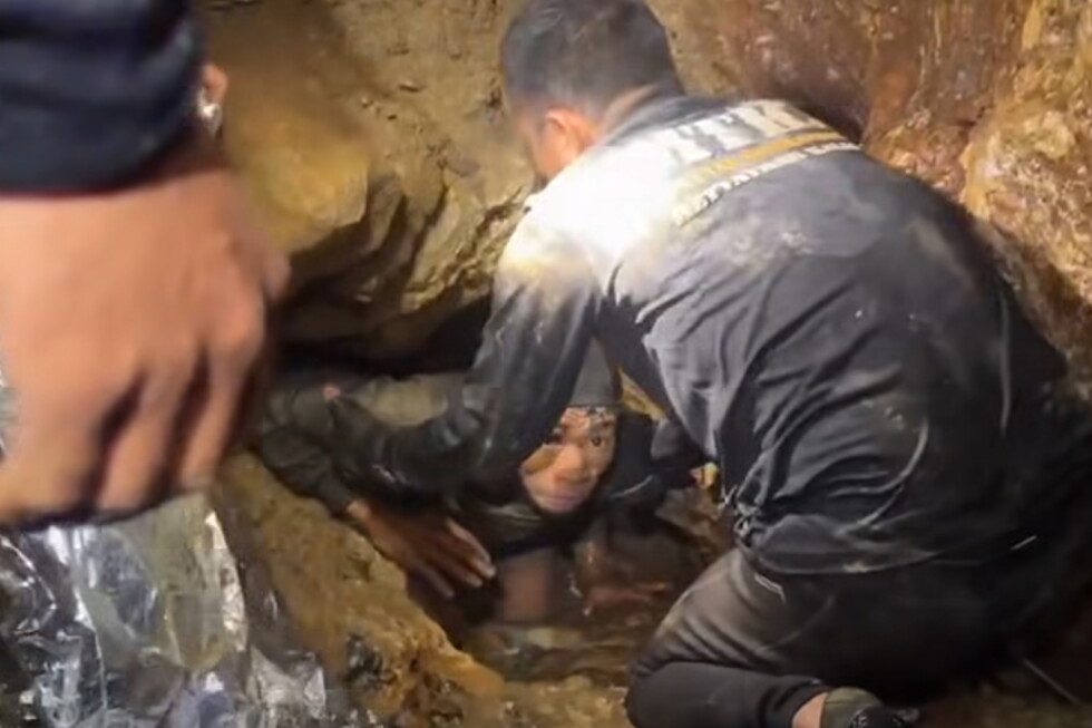 Laos rescue workers seek alternative route to 2 trapped in cave