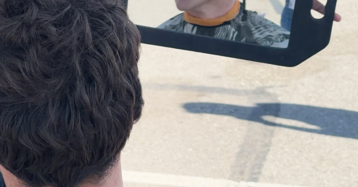 These barbers are outside SoFi Stadium offering free haircuts to soccer fans