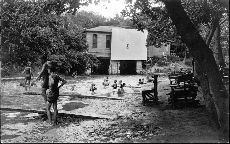Outdoor movies in San Antonio date at least back to the 1920's. On Lambert Beach in Brackenridge Park, a movie screen was attached to the old pump house. Photo from the University of Texas at San Antonio Libraries Special Collections.