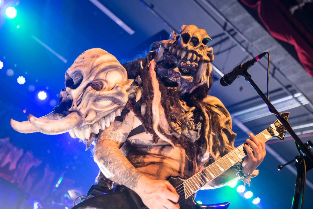 Balsac the Jaws of Death of GWAR performs onstage in full monster costume during a 2016 concert at Marquee Theatre in Tempe.