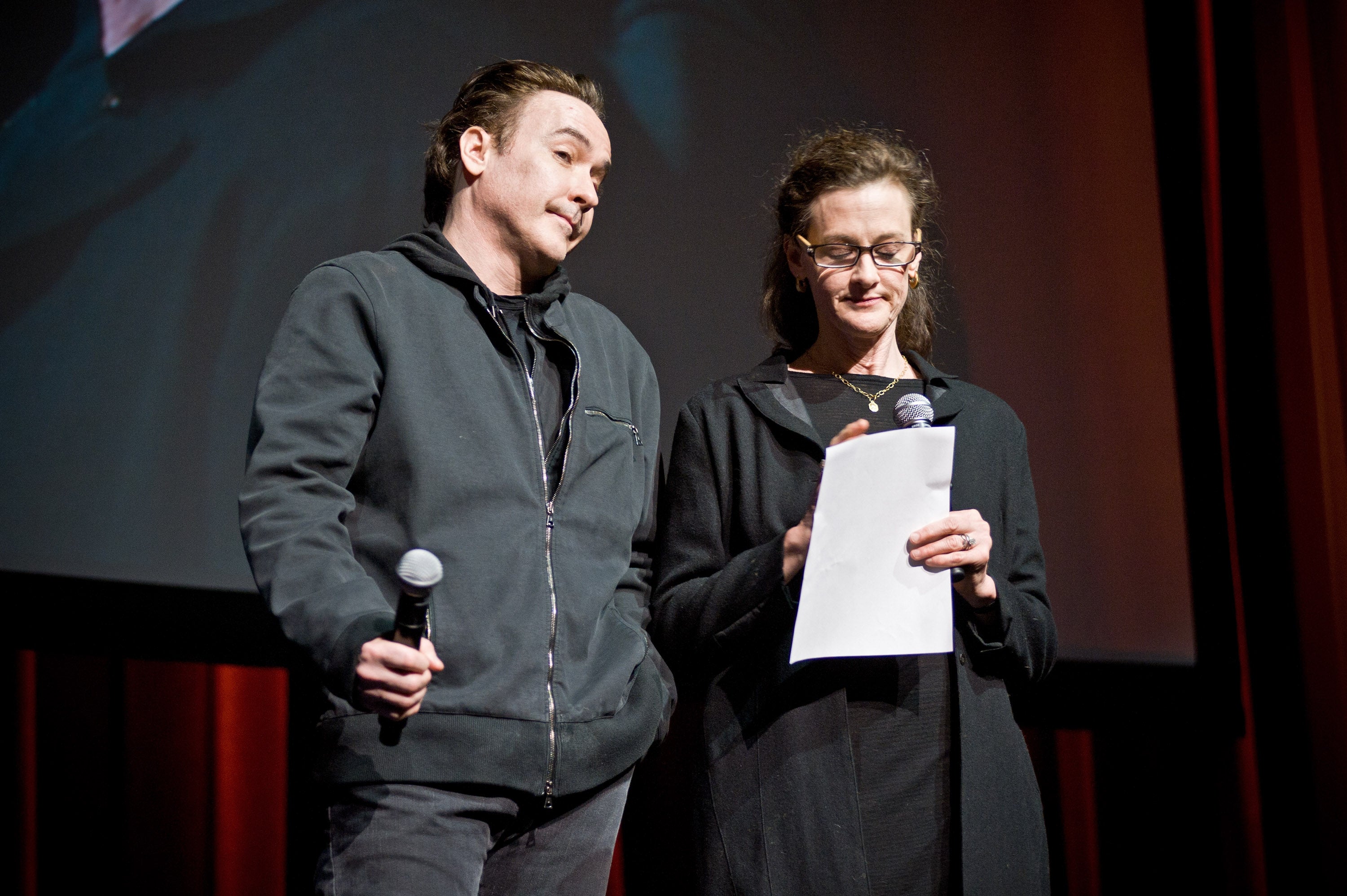 John and Joan Cusack attend the Roger Ebert Memorial Tribute at Chicago Theatre on 11 April, 2013