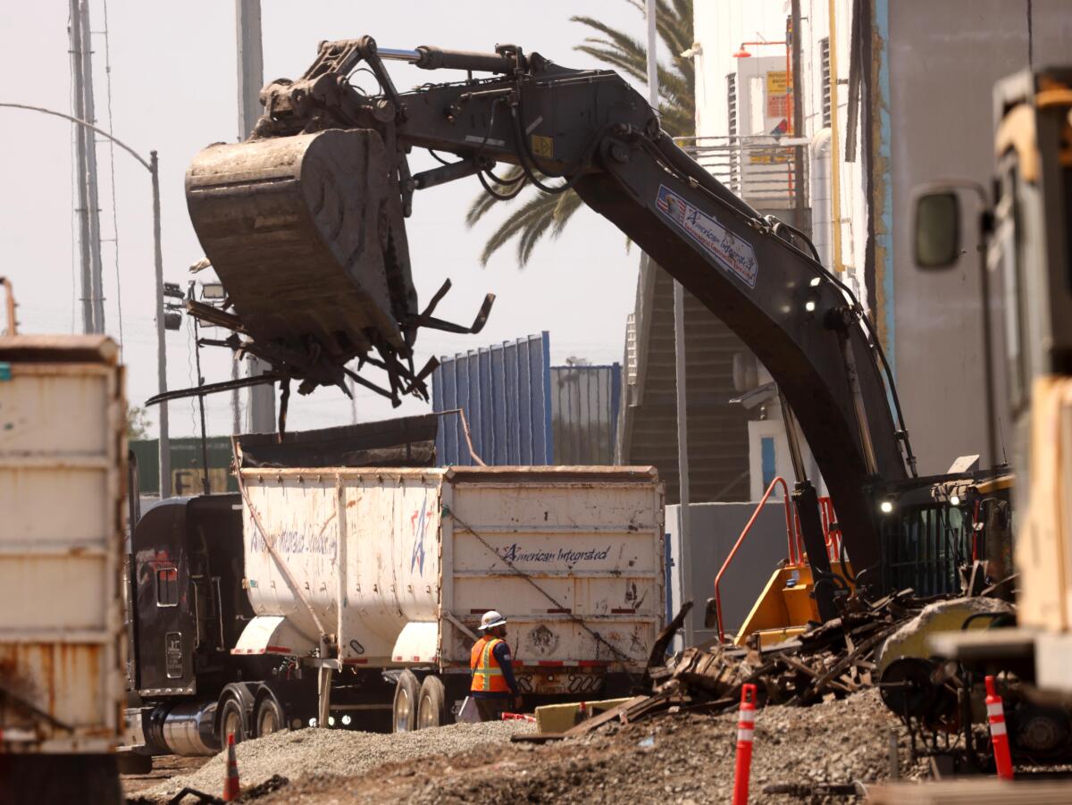 Cleanup continues at the Lineage warehouse in Boyle Heights on Wednesday.