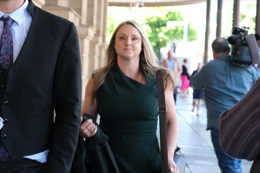 Raina Cruise leaves the Adelaide District Court.