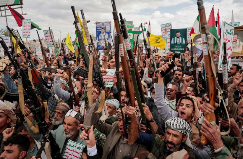 HOUTHI SUPPORTERS hold up weapons as they demonstrate in Sanaa, Yemen, to show solidarity with Lebanon, after a 10-day ceasefire between Lebanon and Israel went into effect, April 17, 2026. 