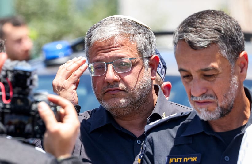 Itamar Ben Gvir (C) arrives at the site of a suspected shooting attack in the town of Tzur Yitzhak in central Israel on June 7, 2026.