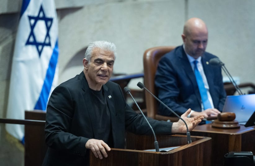 MK Yair Lapid attends a plenum session at the assembly hall of the Knesset, the Israeli parliament in Jerusalem, July 13, 2026.