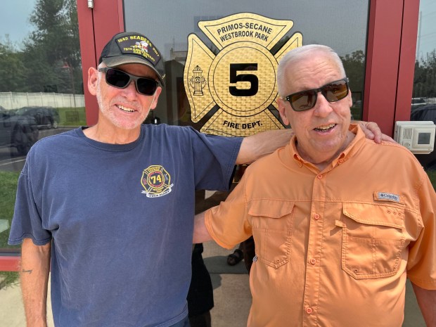 Dan Reagoso, left, and Bruce Criscuolo both joined Primos Secane Westbrook Park Fire Company in 1967. (PETE BANNAN-DAILY TIMES)