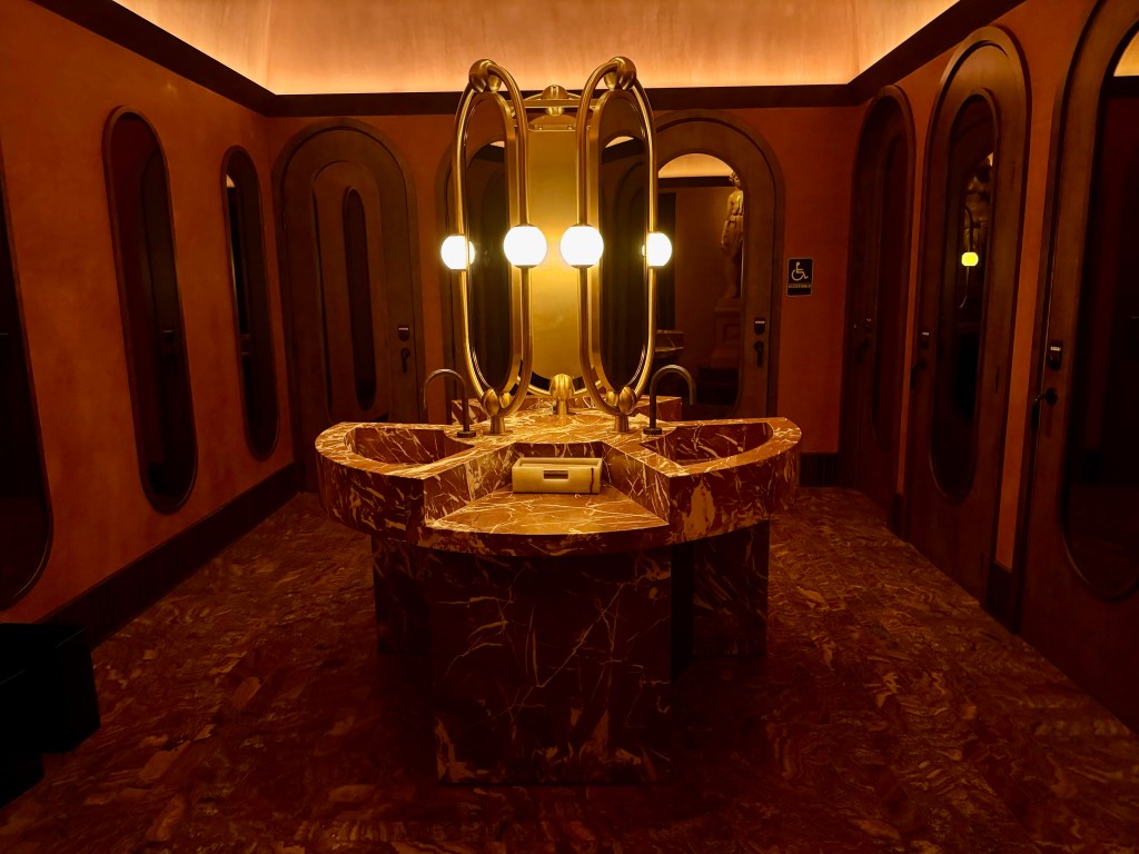 The shared sinks of Roman's ornate bathroom.