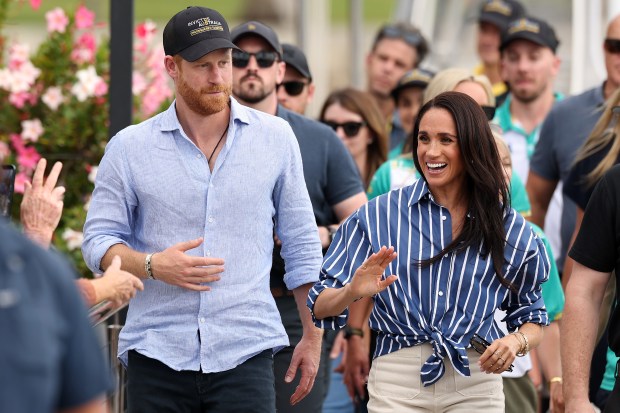SYDNEY, AUSTRALIA - APRIL 17: Prince Harry, Duke of Sussex and Meghan, Duchess of Sussex greet members of the public at the Cruising Yacht Club of Australia on April 17, 2026 in Sydney, Australia. The Duke and Duchess of Sussex are on a four-day visit to Australia, with engagements across Melbourne, Canberra and Sydney. (Photo by Cameron Spencer/Getty Images)