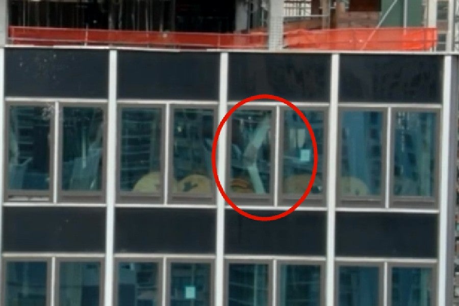 New York City Fire Department officials set up a 'collapse zone' as they tried to save the building from falling down