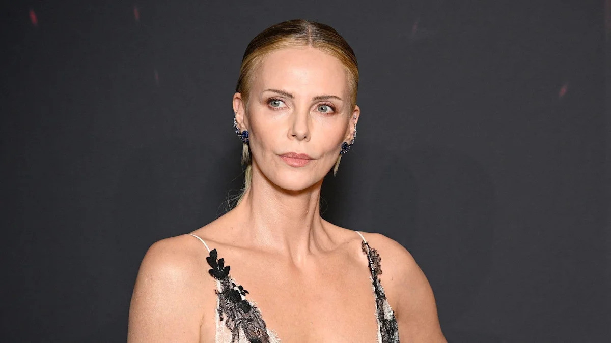 Charlize Theron, 50, stuns in plunging lace gown on red carpet