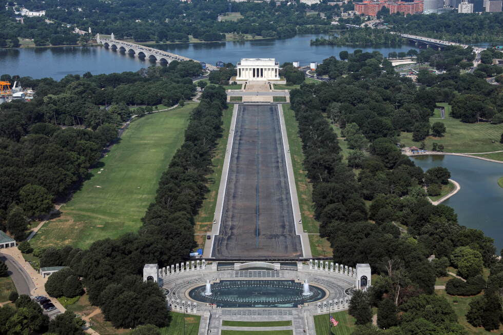 Drained Reflecting Pool reveals faded liner after renovation