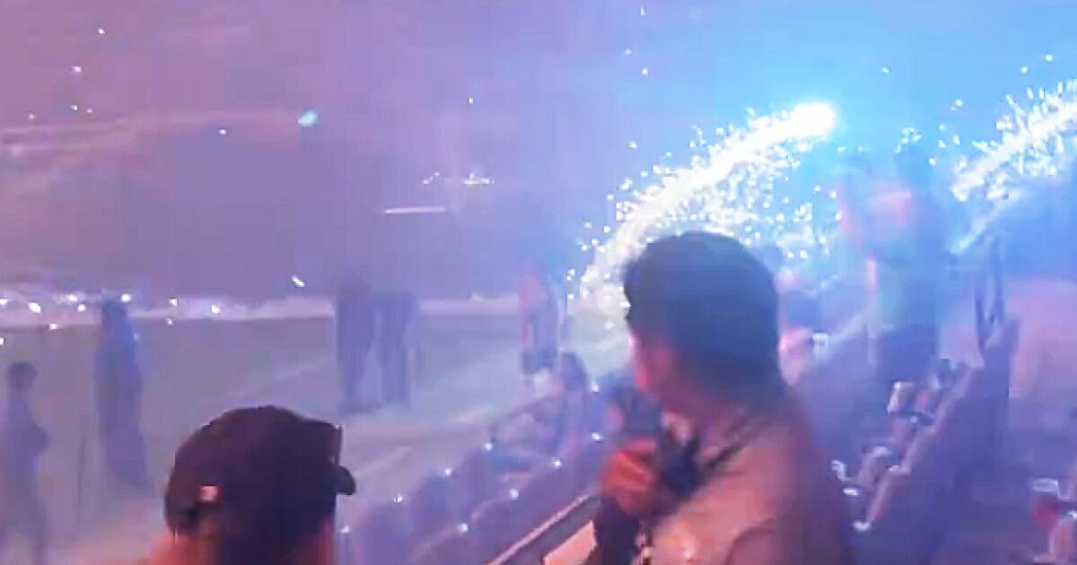 Fans scram: Fireworks head into the stands at BMO stadium after Angel City FC match