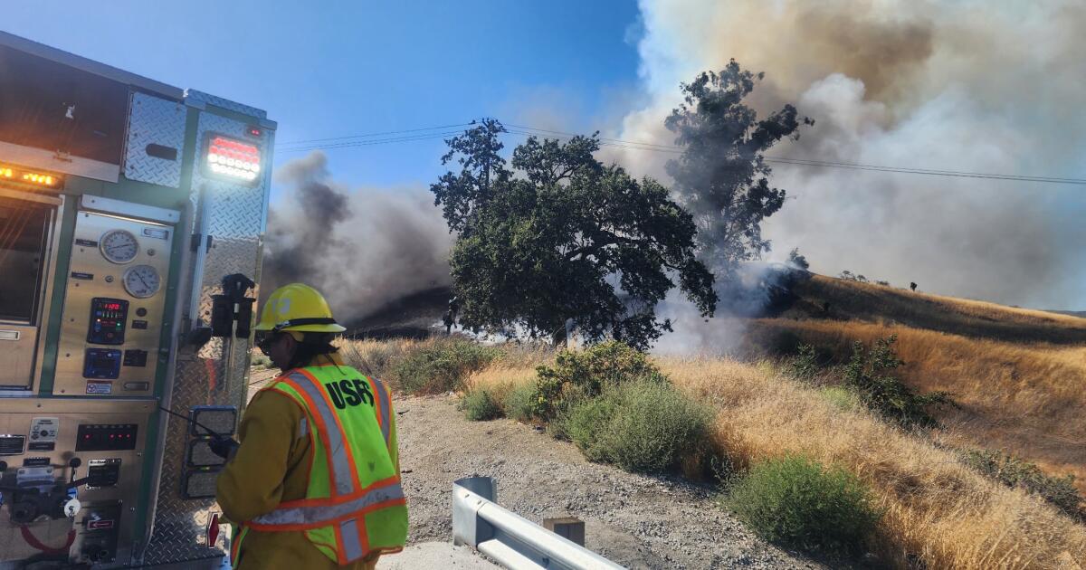 I-5 lanes closed as burning truck sparks brush fire