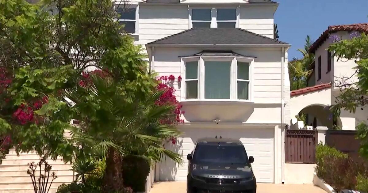 Two found fatally shot inside Westwood home in possible murder-suicide