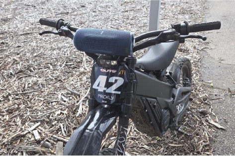 An e-bike with the numbers 42 printed under the handlebar.
