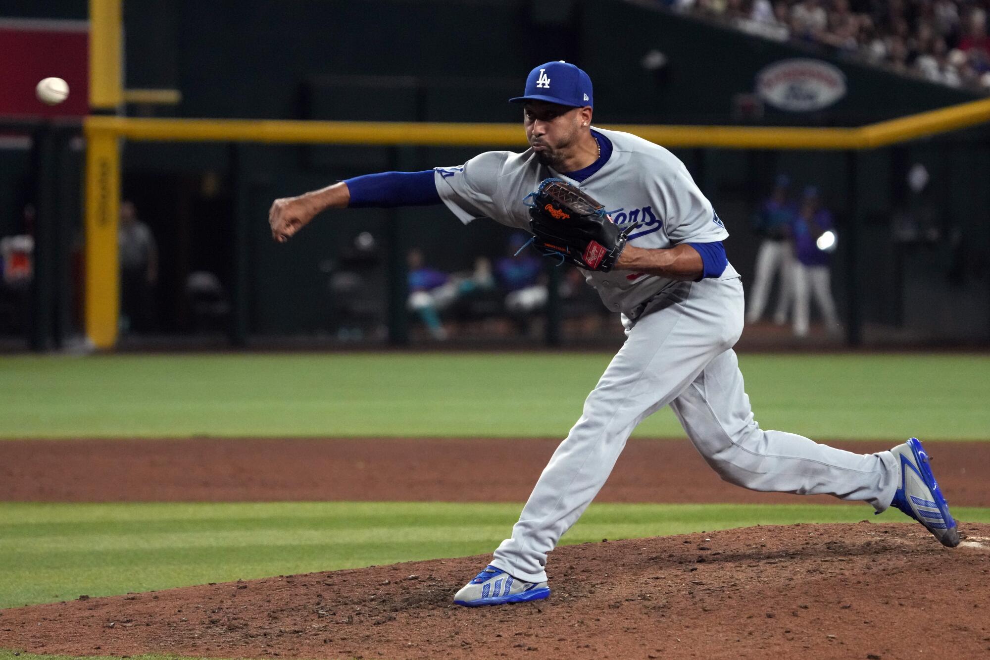 Dodgers pitcher Edwin Díaz delivers against the Arizona Diamondbacks in the ninth inning Friday.