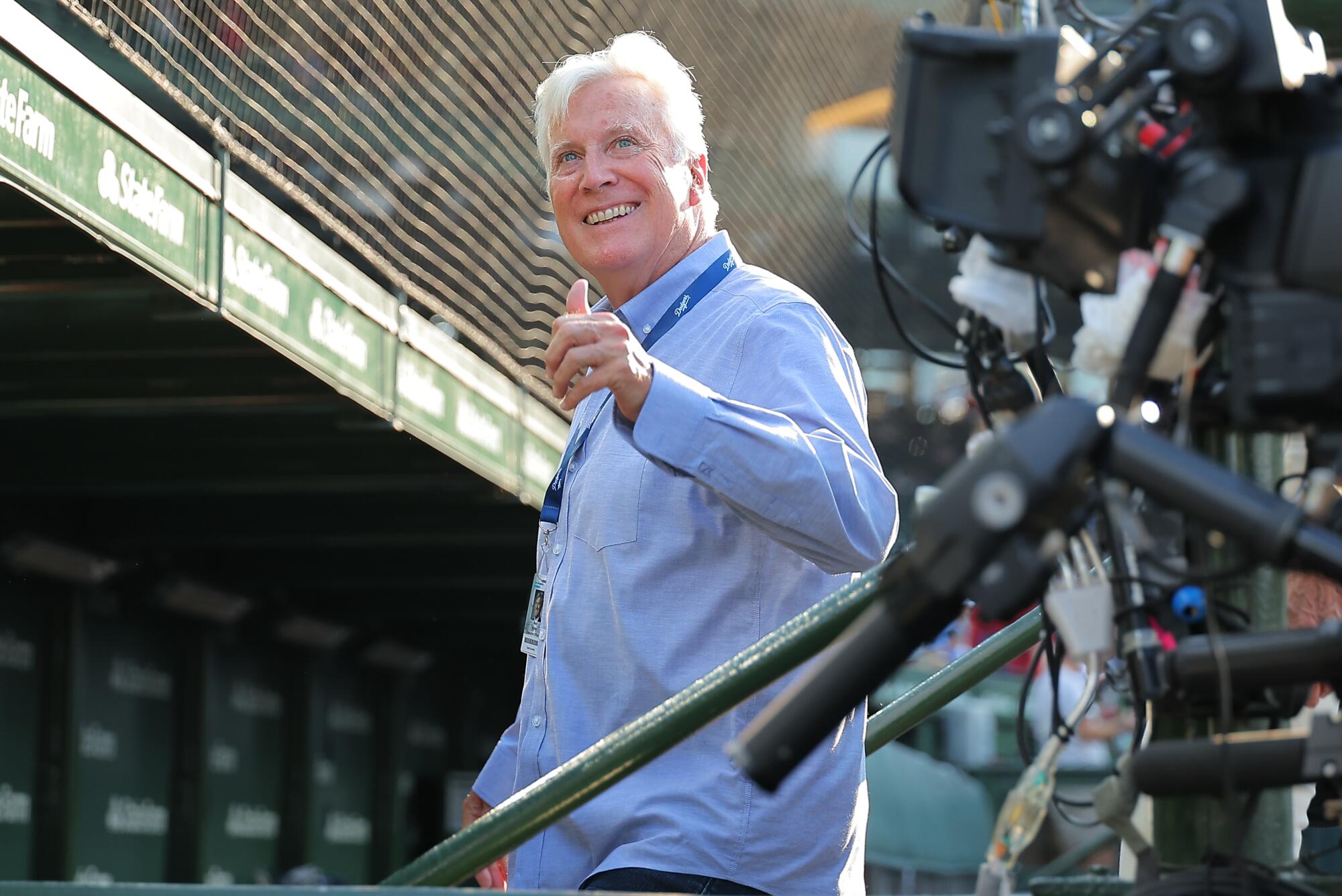 Mark Walter, chairman and controlling owner of the Dodgers, acknowledges a fan before a game in Chicago on Aug. 4.