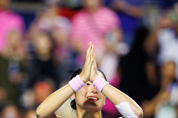 Alexandra Eala, of the Philippines, gestures to the crowd after losing to Belinda Bencic, of Switzerland, during a round of 16 match at the National Bank Open tennis tournament in Toronto, on Sunday, Aug. 9, 2026. (Keito Newman/The Canadian Press via AP)