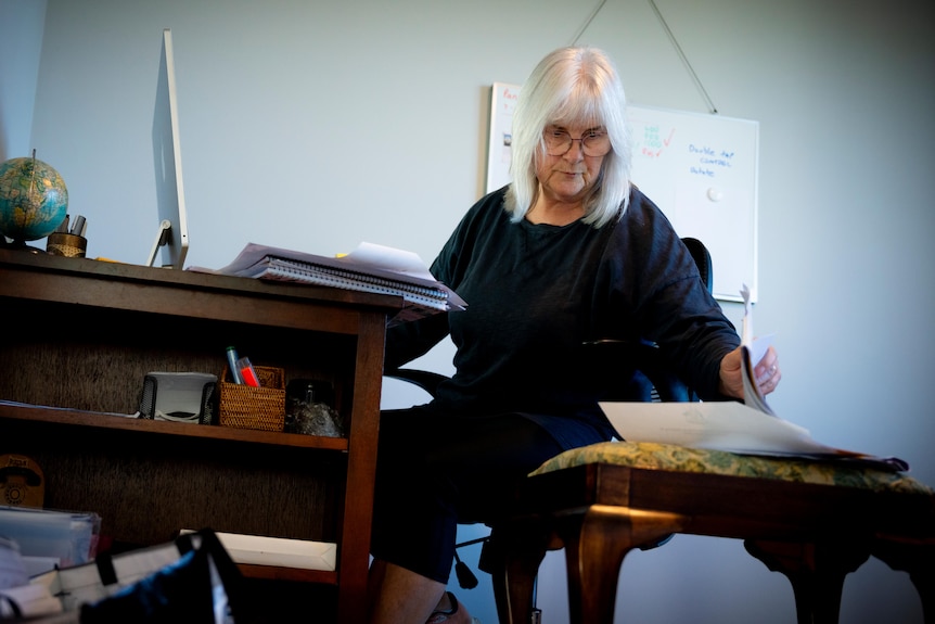 A person at a desk.