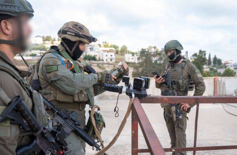 IDF soldiers map out a terrorist's home in preparation for its demolition, July 25, 2026.