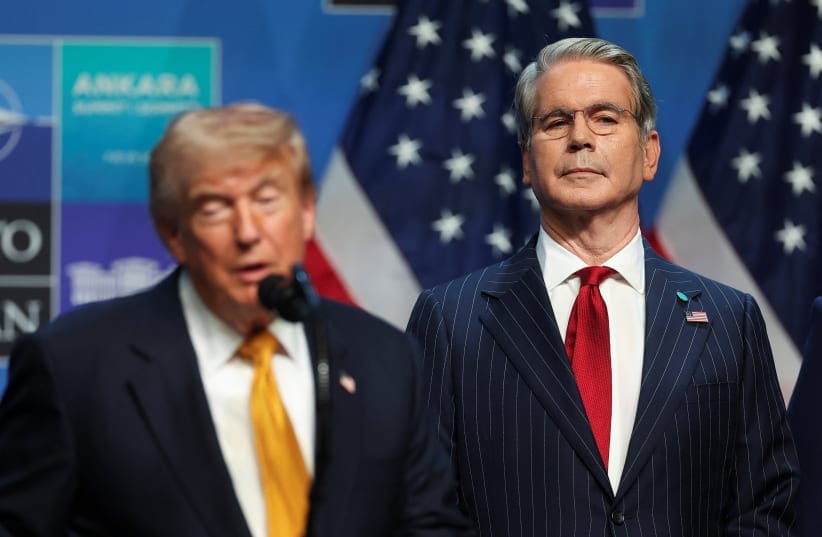 US Treasury Secretary Scott Bessent stands behind U.S. President Donald Trump who speaks to the media on the day of a NATO leaders' summit in Ankara, Turkey, July 8, 2026.