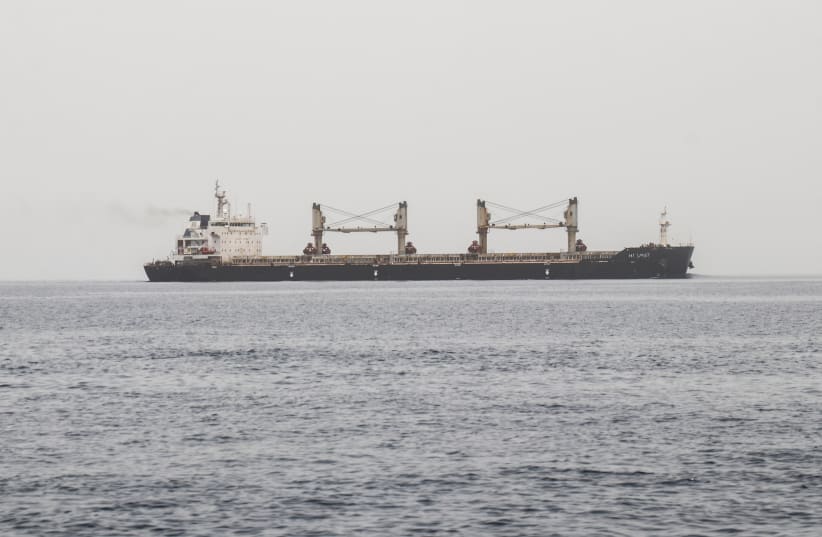 A commercial vessel passes through an international shipping lane off Yemen's Hanish Island in the Red Sea on July 27, 2026; Illustrative.