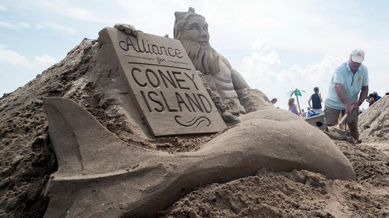 Coney Island Sand Sculpting Contest, Saturday, Aug. 18, 2018, in New York. (AP Photo/M
