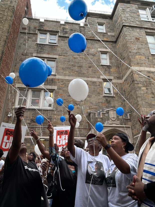 Mourners release balloons at a vigil for the late 15-year-old Riley Billingslea, who was shot and killed in an apartment on Claflin Avenue in the Bronx. (Kerry Burke/New York Daily News) 
