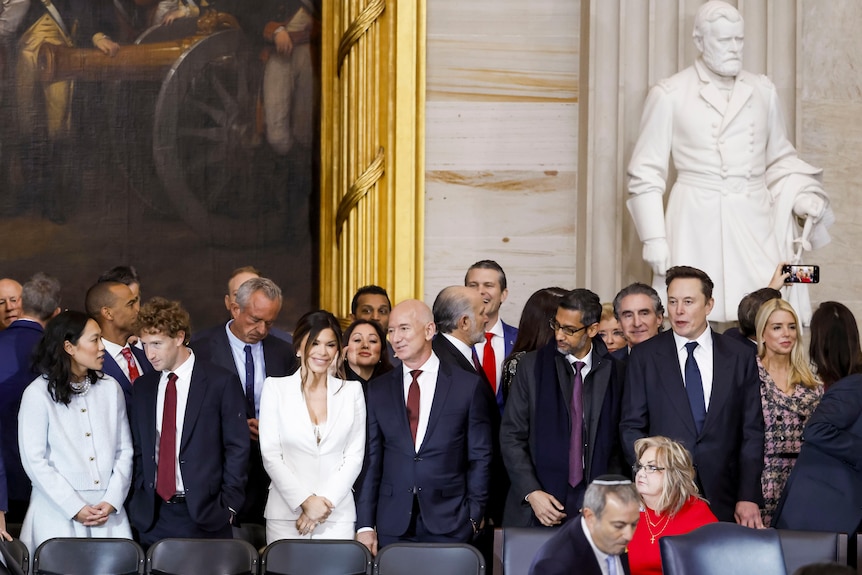 A crowd of people, including Mark Zuckerberg, Jeff Bezos and Elon Musk  attend Donald Trump's inauguration