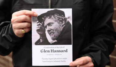 Bono, Eddie Vedder join hundreds of mourners at the funeral of musician Glen Hansard