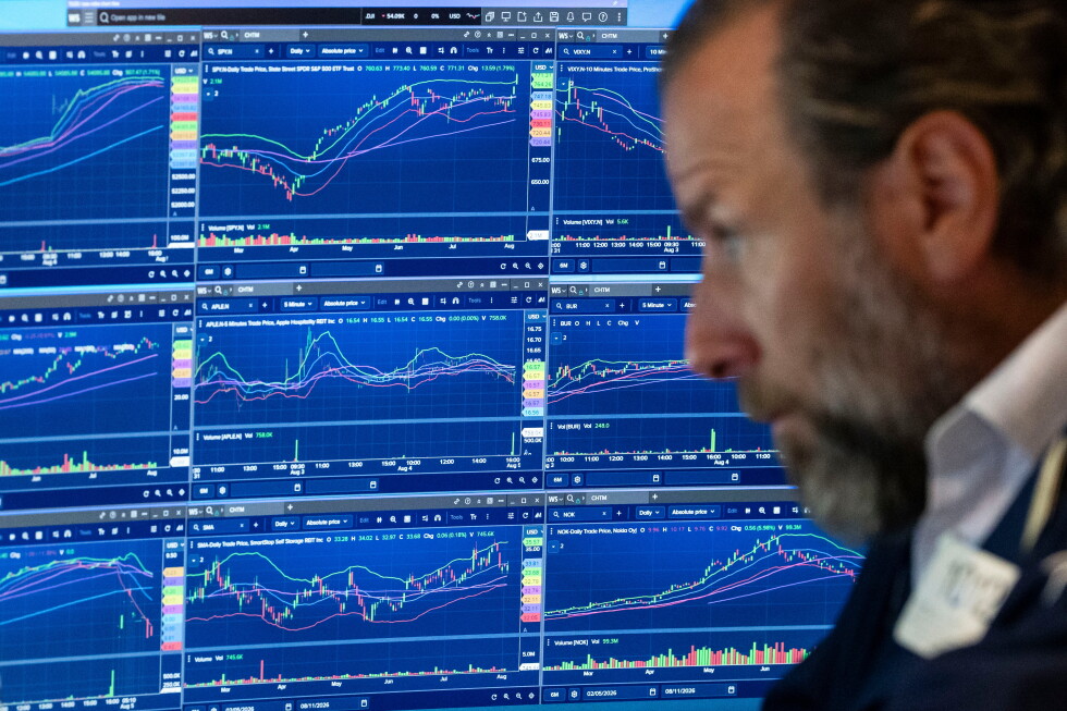 Wall Street holds near its record following the latest weak update on the US economy