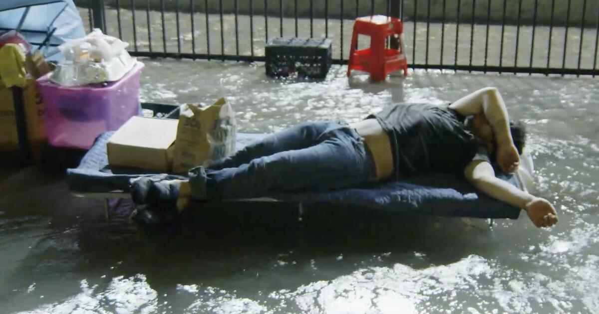 Westlake water main break floods streets and homeless encampment