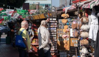 Despite inflation squeeze, Americans keep spending as sentiment climbs