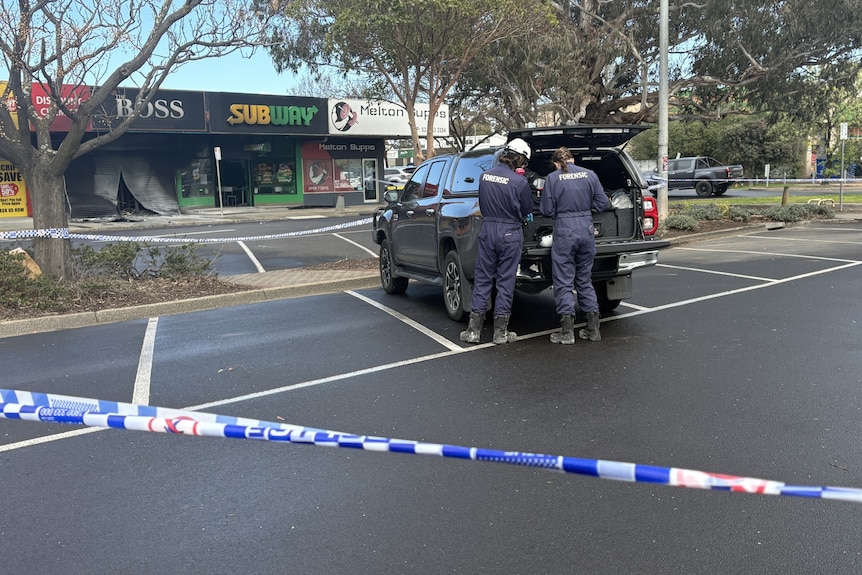 Forensics police at a fire scene