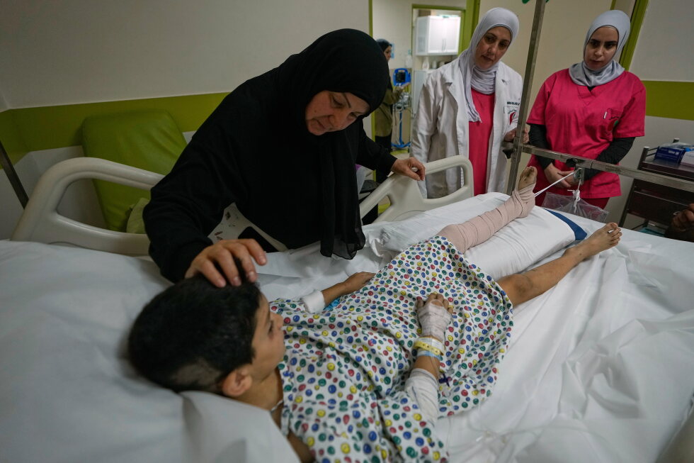 Israeli airstrikes on a village in southern Lebanon kill 12 people