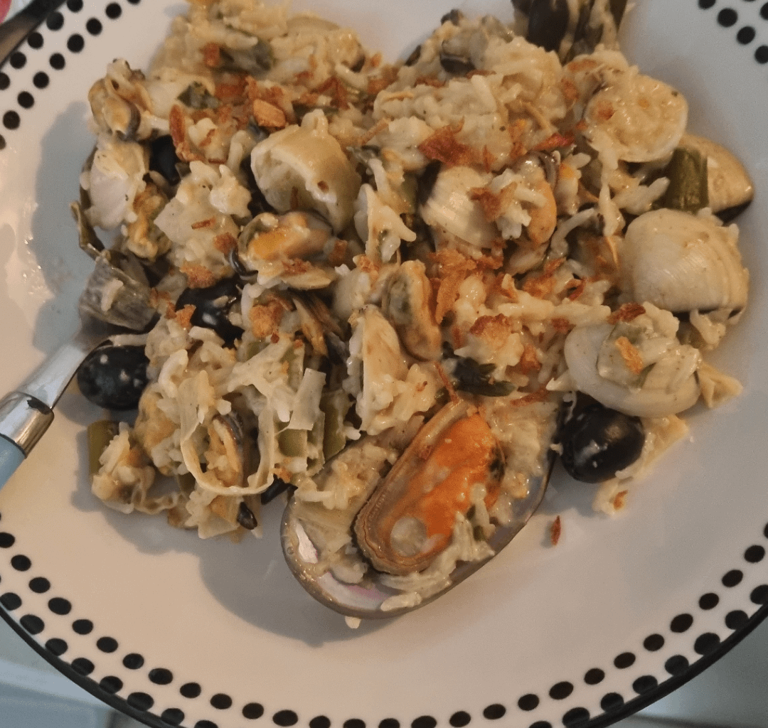 Risotto de la mer, poireaux, olives.