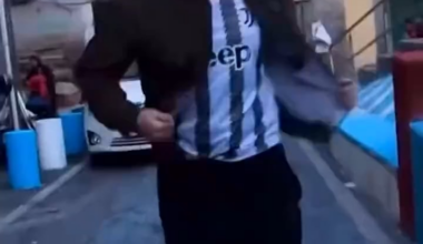 Juventino walking in Naples streets wearing Juventus shirt