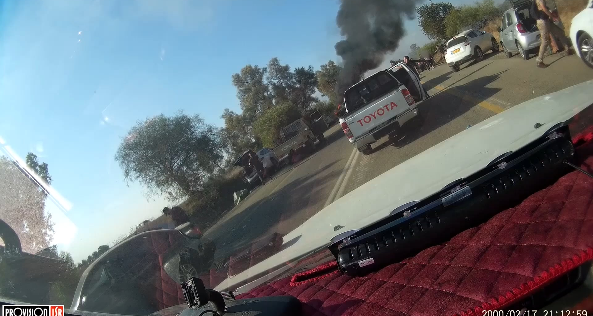 Hamas terrorists fire a surface-to-air missile on a helicopter that arrived to help on October 7th