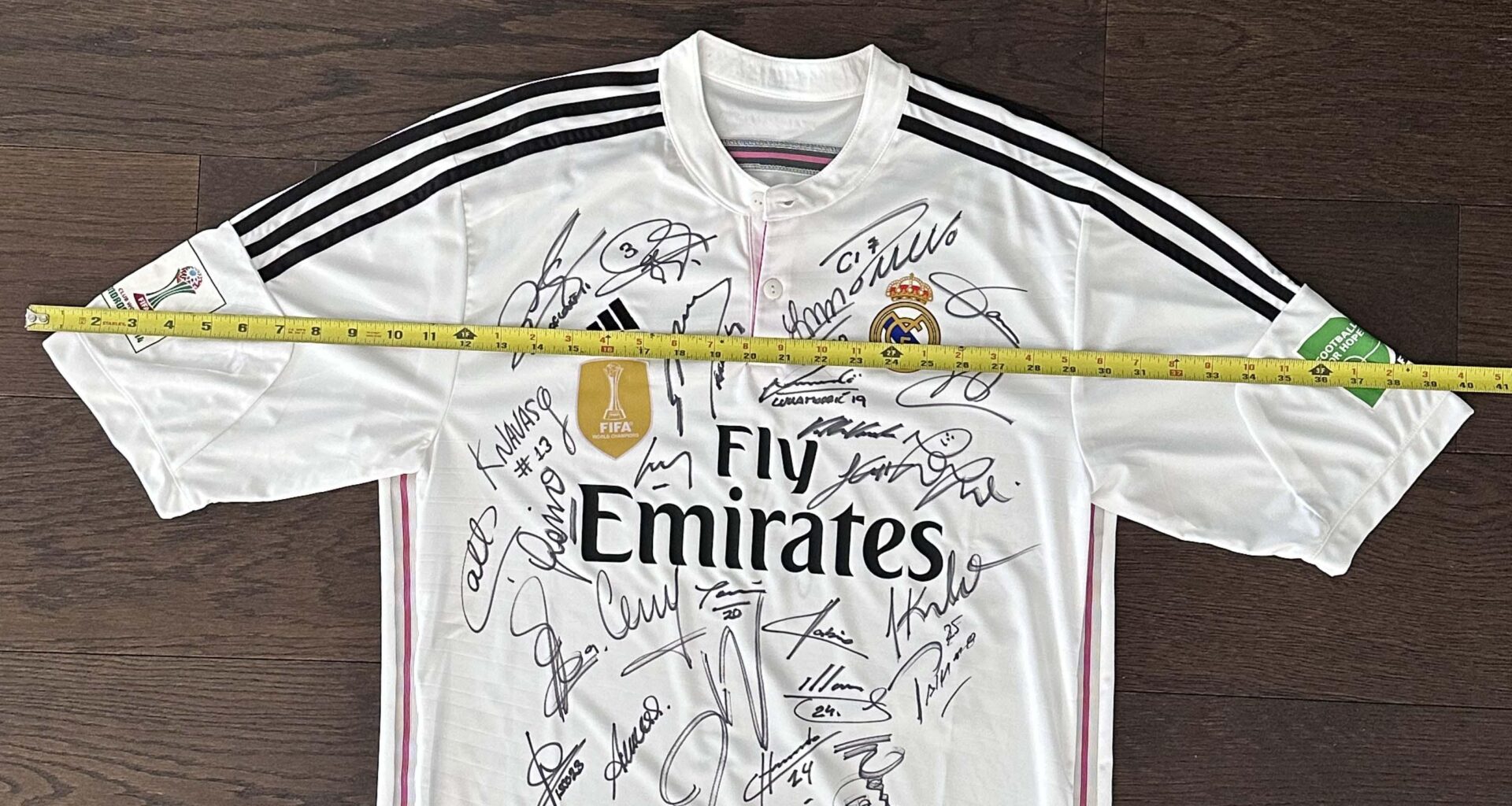 Help identifying signatures on this jersey from 2014