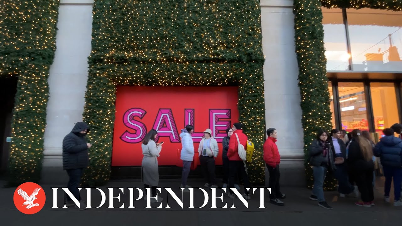 Shoppers queue outside Selfridges on Oxford Street for Boxing Day sales