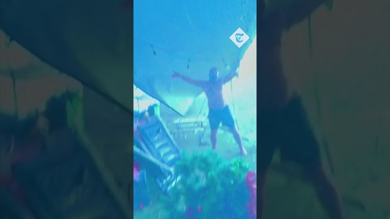 Australian family fights to hold down caravan shelter during storm