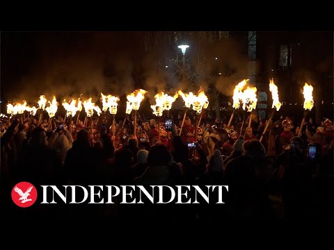 Thousands of torches light Edinburgh streets kicking off Hogmanay celebrations