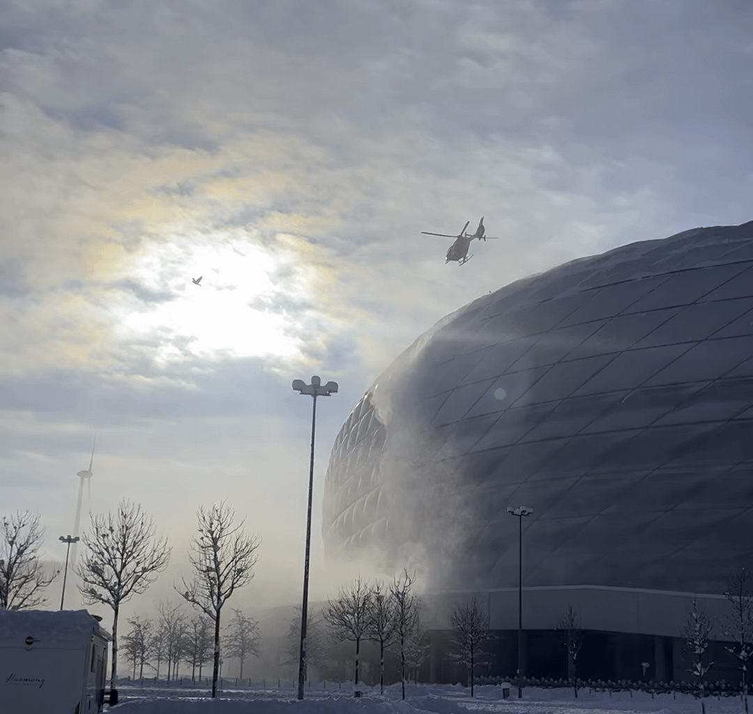 Clearing Snow off Alliance with a helicopter