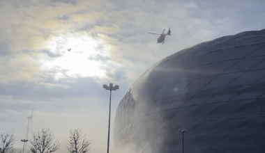 Clearing Snow off Alliance with a helicopter