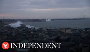 Japan lowers tsunami alerts but warns coast residents of risk after earthquakes
